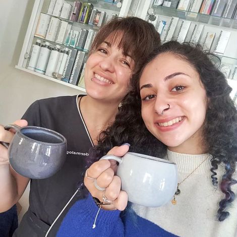 two ladies drinking tea 